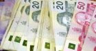 Bank of Canada cuts lending rate to record low of 1%